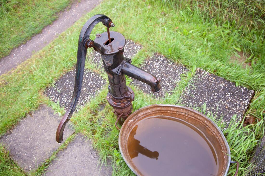 rustic old water pump